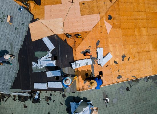 Roofer repair replace shingle that has been damaged and needing replacement